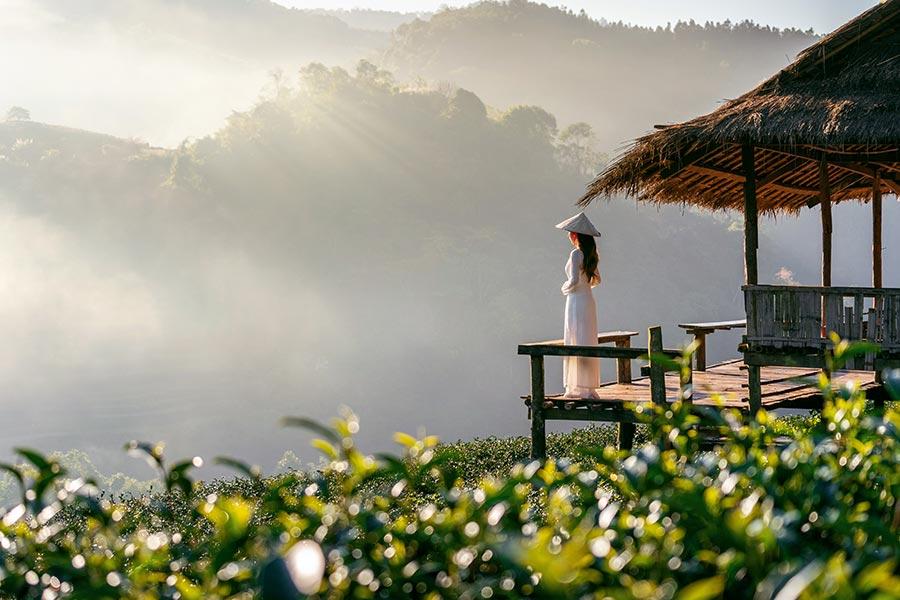 Woman standing on a veranda